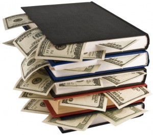 Dollars in the books, isolated on white background, business training.